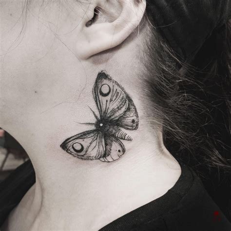 girly moth tattoo|moth neck tattoo.